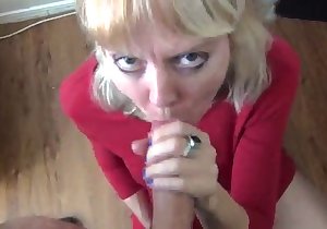 Funny-looking blonde MILF deepthroating dick