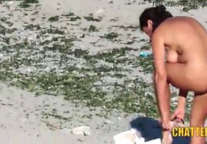 Horny women showing their nude bodies on a beach