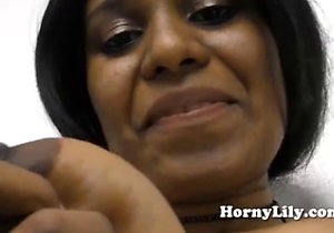 Ebony chick with saggy tits teasing the camera